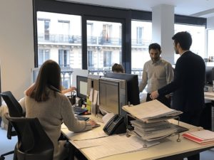 Employees in the office, preparing to move